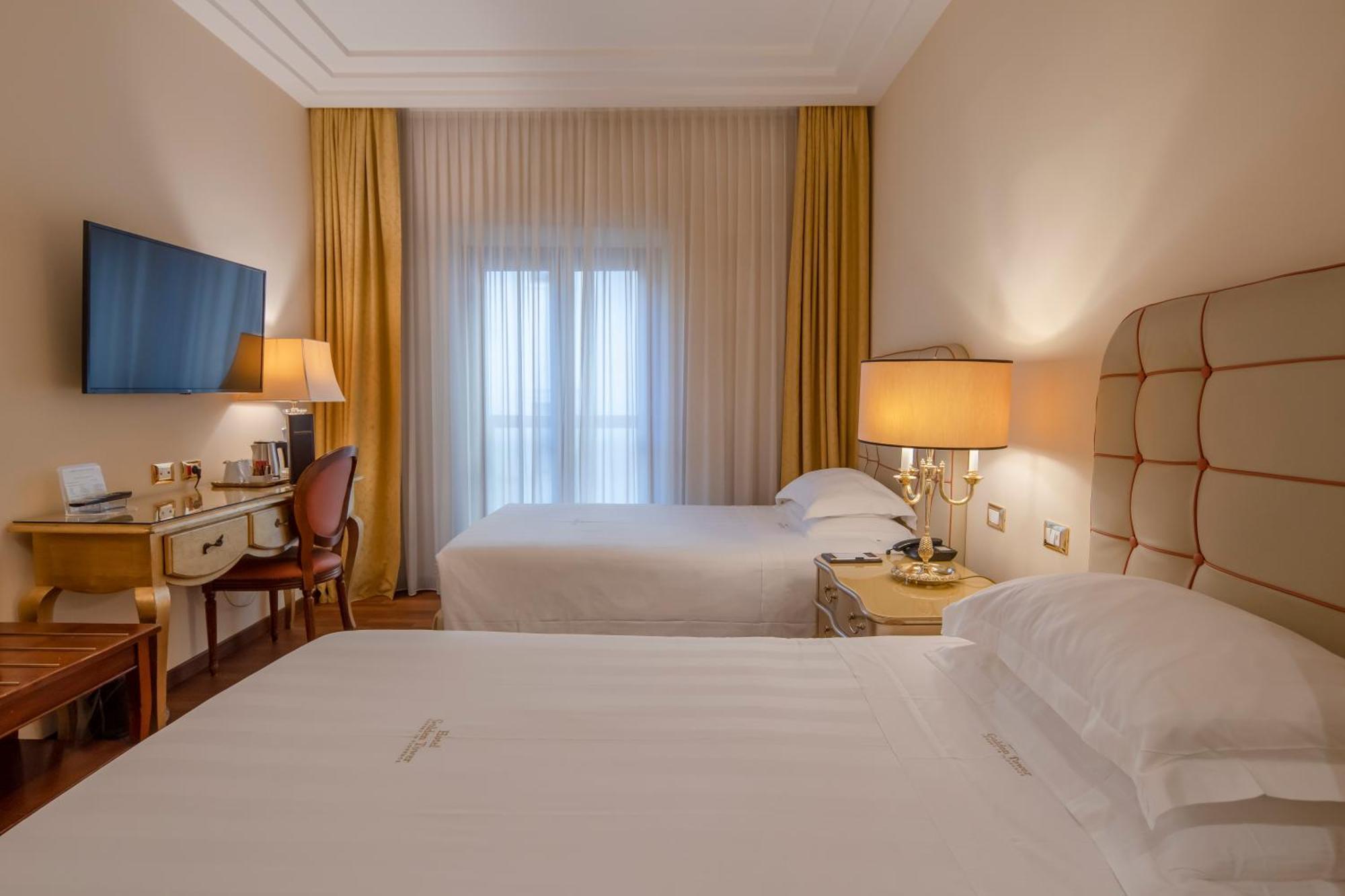 Golden Tower Hotel & Spa Florence Exterior photo A room at the hotel